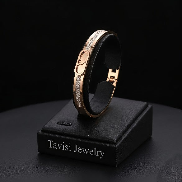 Tavisi Roman Letter CZ Bracelet in 316L surgical stainless steel with 22K gold finish, Roman rectangle centerpiece, dual CZ detailing, anti tarnish protection, adjustable fit, size 2.4
