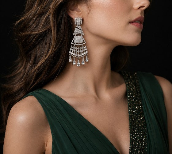 Woman wearing Tavisi Royal Cascade AD CZ Premium Brass Silver Finish Long Statement Earrings