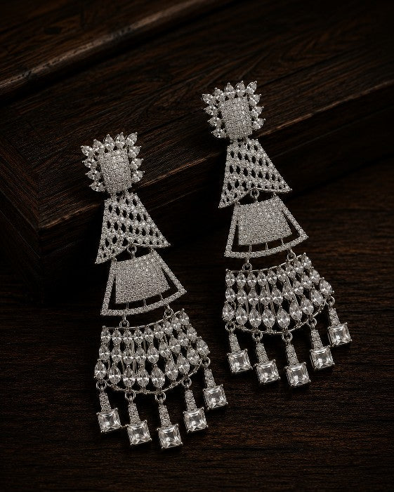 Female model wearing Tavisi Royal Cascade Premium Brass AD CZ Designer Statement Earrings