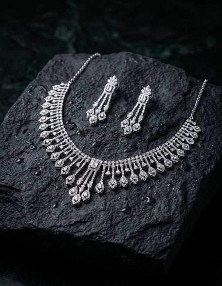 Woman wearing Tavisi Royal Cascade AD CZ Premium Brass Silver Finish Bridal Necklace Set with Matching Earrings
