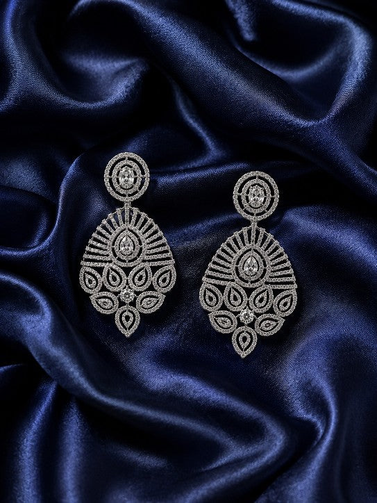 Woman wearing Tavisi Royal Radiance AD CZ Premium Brass Silver Finish Statement Earrings