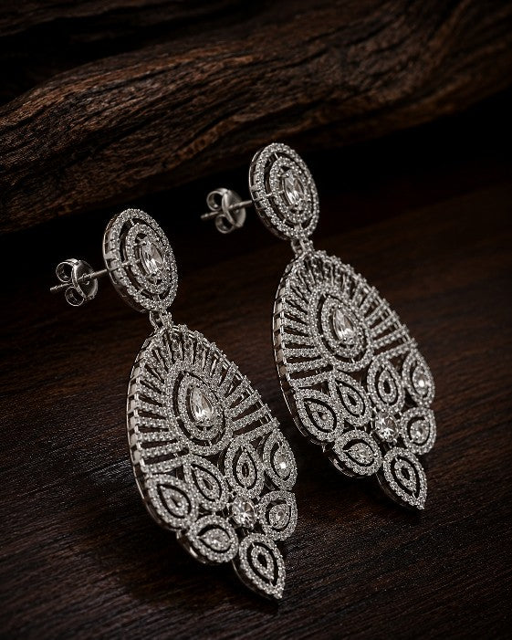 Model wearing Tavisi Royal Radiance AD CZ Premium Brass Bridal Statement Earrings