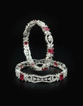 tavisi-royal-ruby-cz-silver-polish-bangle-angle-view.