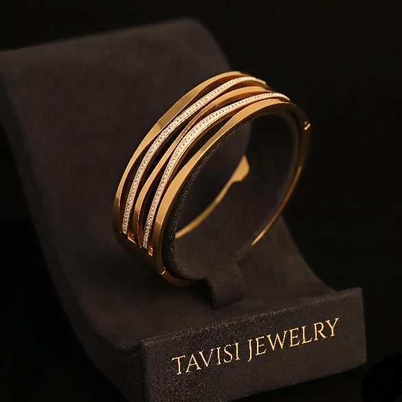 Tavisi Royal Wave Kada in 316L surgical stainless steel with dual CZ stone lines, 22K gold finish, anti tarnish protection, long lasting shine, size 2.4
