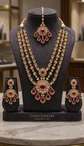Tavisi Ruby Majesty layered necklace set with AD stones, white CZ stones, ruby pink stones and mehanti color finish.