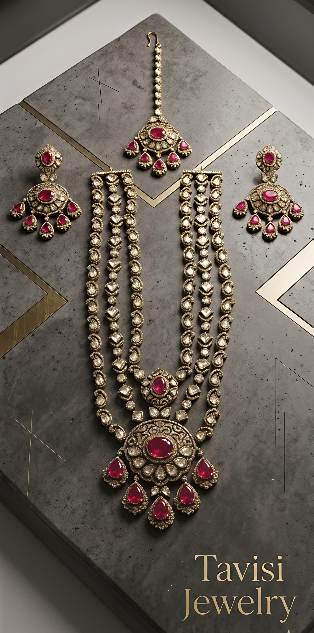Close-up of Tavisi Ruby Majesty necklace with AD detailing, CZ stones, ruby pink stones and brass casting.