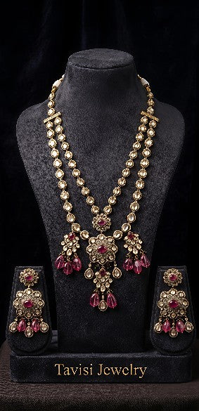 Tavisi Ruby Noir layered necklace set with AD stones, CZ stones, ruby pink beads, brass casting and mehanti