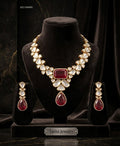 Tavisi Sabyasachi inspired ruby red AD Kundan statement necklace set with matching earrings in premium brass.