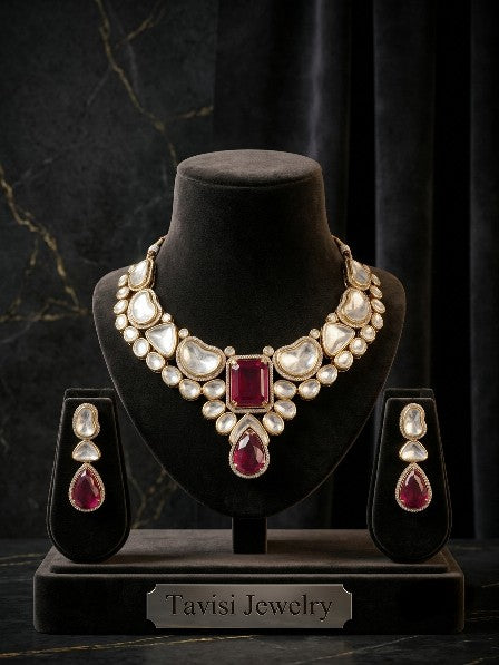 Tavisi Sabyasachi inspired ruby red AD Kundan statement necklace set with matching earrings in premium brass.