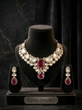 Tavisi Sabyasachi inspired ruby red AD Kundan statement necklace set with matching earrings in premium brass.