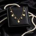 Tavisi Serina Gold Snail Charm Tanmaniya Necklace with premium AD American Diamond stones 316L surgical stainless steel and 22K anti tarnish finish 