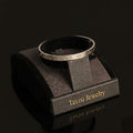 Tavisi silver screw open free size anti tarnish stainless steel bracelet for women with long lasting shine
