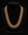 Tavisi traditional palakka necklace with green and ruby AD CZ stones in gold finish