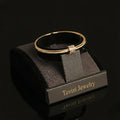 Tavisi Trinity Spark Bangle bracelet size 2.4 with CZ stones in 316L surgical stainless steel and 22K gold plated anti tarnish finish, waterproof lightweight bracelet for women
