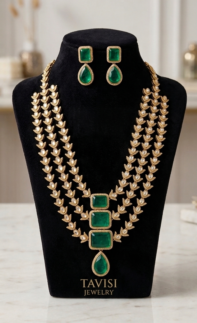 Front view of Tavisi Victorian three layer polki kundan necklace set with white stones and emerald green stones.