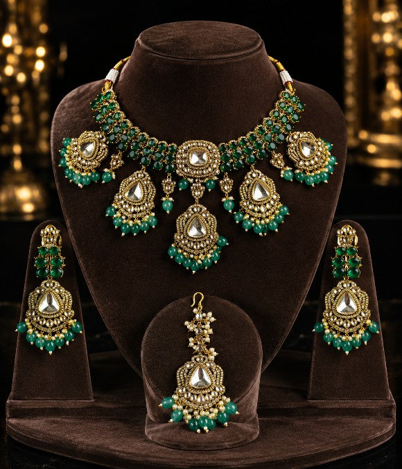 Tavisi long lasting brass casting mehendi finish CZ AD kundan bridal necklace set with green stones, green beads and white pearls.
