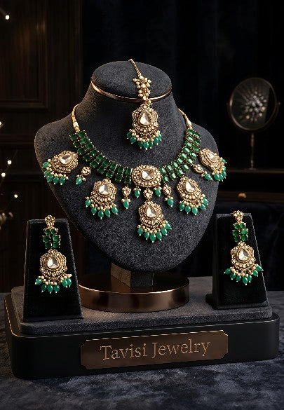 Tavisi long lasting brass casting mehendi finish CZ AD kundan bridal necklace set with green stones, green beads and white pearls.