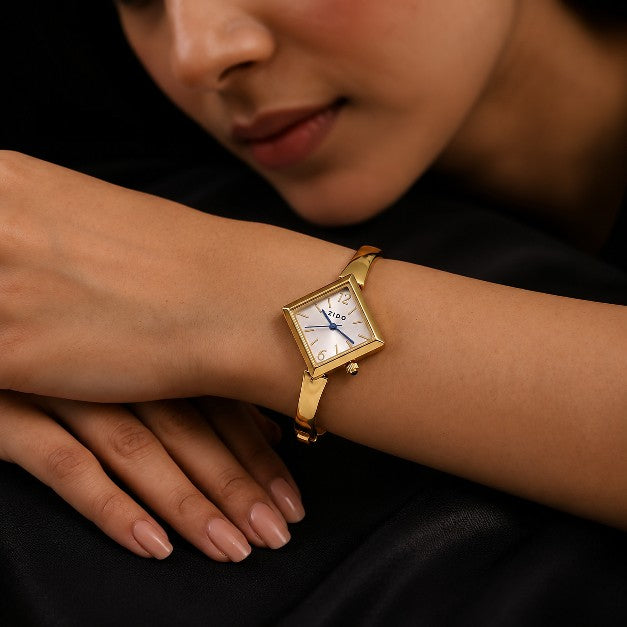 Woman wearing Tavisi Zido WT84 Gold Plated Stainless Steel Watch Kada with White Square Dial