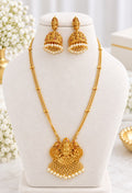 Vaidehi Antique Gold pendant necklace set with heavy-work jhumka earrings and pearl drops