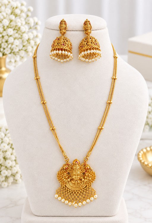 Vaidehi Antique Gold pendant necklace set with heavy-work jhumka earrings and pearl drops