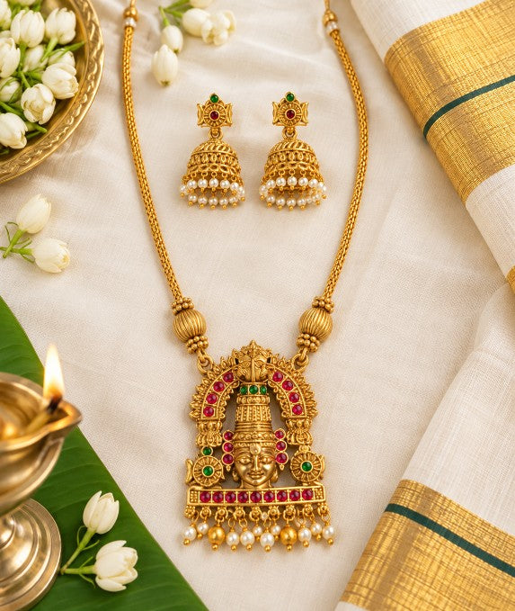 Antique Gold brass Lakshmi pendant necklace with pearl embellishments and jhumka earrings