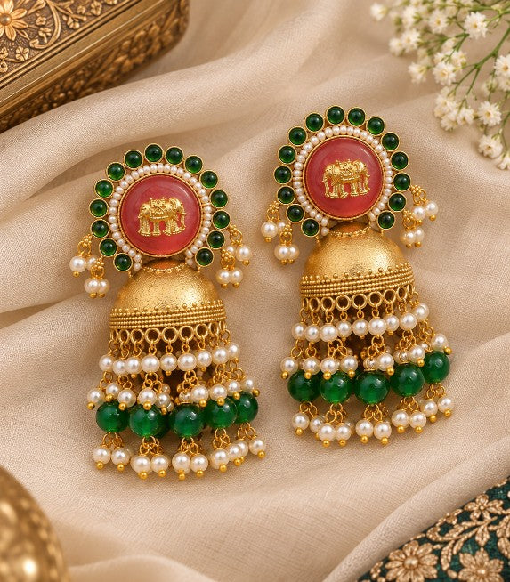 Vaidehi gold elephant dangler earrings with green and red decorative stones