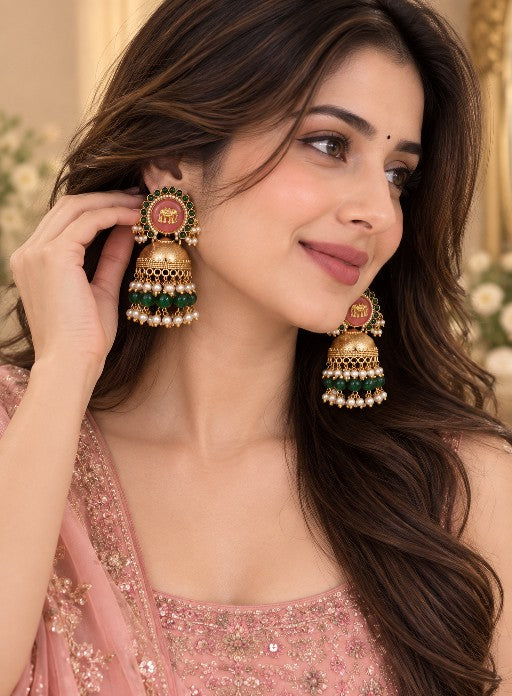 Close-up of Vaidehi elephant motif dangler earrings with pearl detailing