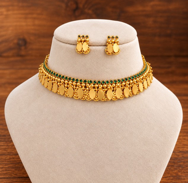 Vaishnavi Emerald Stone Coin Elakkathali Choker Set in antique gold finish