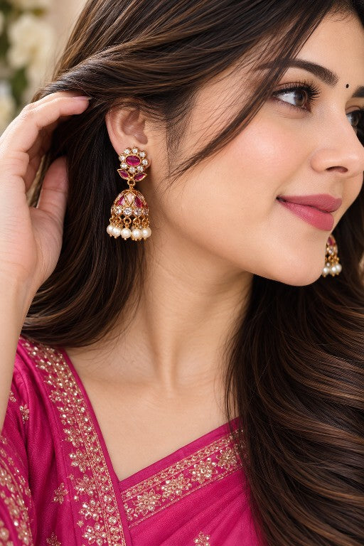 Vallari premium brass floral and leaf jhumka earrings with pearl drops and gold finish