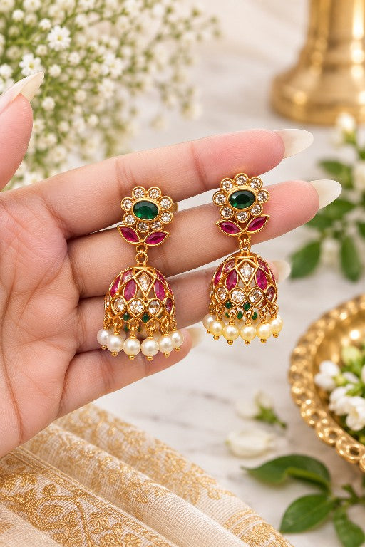 Vallari premium brass floral pearl jhumka earrings with green and pink decorative stones