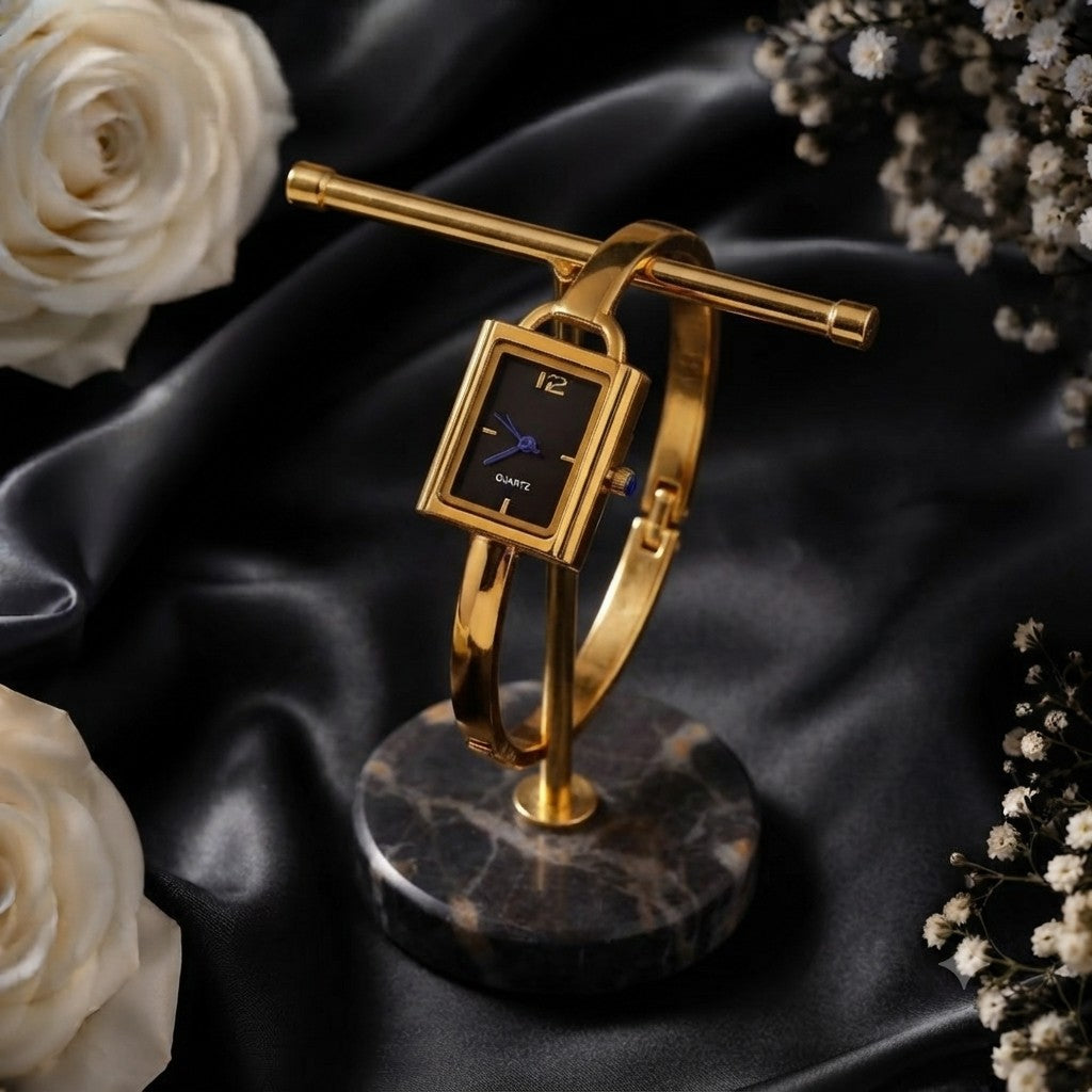Elegant ZIDO gold plated rectangle bracelet watch for women with black dial and blue watch hands side view